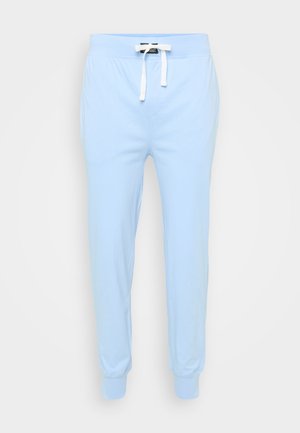 Joggers en coton bleu clair avec une taille élastique, un cordon de serrage blanc et des poignets côtelés. Design simple, adapté à un usage décontracté.