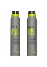 Gray aerosol canisters with black and bright yellow accents, labeled "KMS Hair Play." Text highlights re modelable, weightless styling.