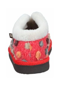 Red and multicolored patterned wool slipper with black sole and white fluffy cuff, viewed from the heel.
