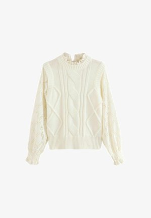 Kootud kreemjas kampsun, millel on kaablidisain ja pitsimustriga varrukad. Omab volangiga kaelust ning soonikkoes ääre ja mansette. Pehme tekstuur.