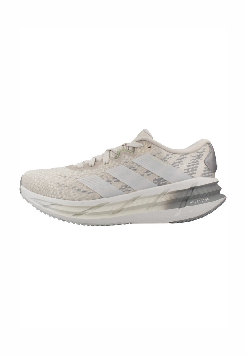 Light beige Adidas running shoe with textured upper, three stripes on side, cushioned sole, and "Repetition" text on heel.