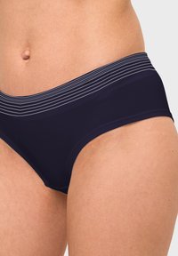 Navy blue hipster underwear with a smooth material and a striped elastic waistband. The fabric has a soft texture and a snug fit.