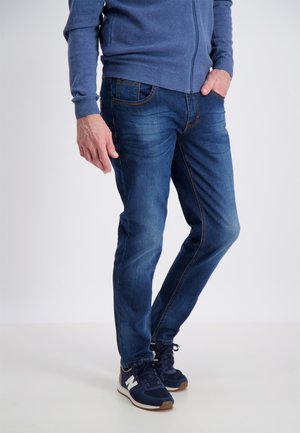 SUPERFLEX - Slim fit jeans - denim wash