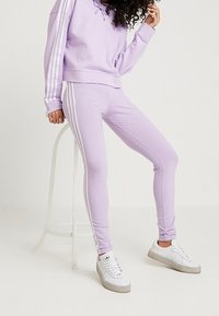 adidas Originals Legíny - kalhoty  - purple