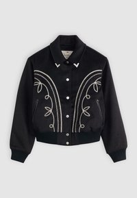 Veste noire ornée de broderies florales argentées, avec un devant à boutons, un col, des poignets côtelés, des poches latérales et des accentuations décoratives en métal.