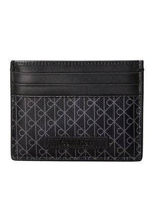 Porte-cartes noir Calvin Klein avec trois emplacements pour cartes en haut et une poche avant à motif avec un patch logo Calvin Klein.