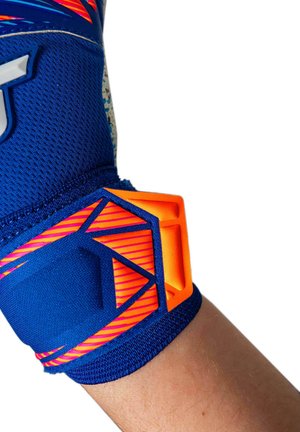 Blue and orange wrist brace with geometric patterns secured around a person's forearm against a white background.