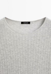 Light gray knit top with a round neckline, subtle vertical eyelet pattern, and black "Massimo Dutti Made in Morocco" label at the collar.