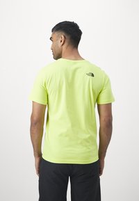 The North Face EASY TEE - Camiseta estampada - fizz lime