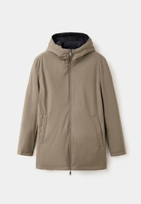 Veste d'hiver beige à capuche avec fermeture éclair devant et deux poches latérales, présentée sur fond blanc.