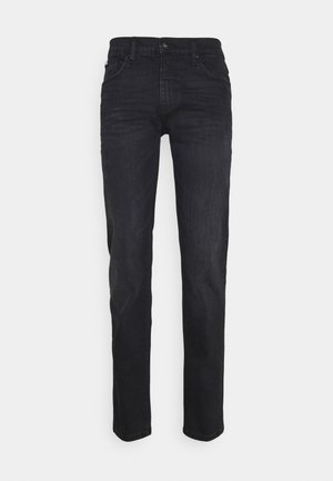 Svarta denimjeans med rak bendesign, fem fickor, lätt blekning och en knappslutning vid midjan.