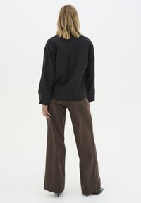 My Essential Wardrobe LARAMW  - Alt laienevad teksad - delicioso washed