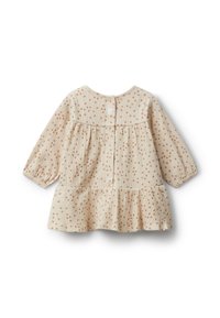 Krémové dětské šaty s dlouhými rukávy, hnědými puntíky, zapínáním na knoflíky vzadu a nařaseným volánkem na lemu.