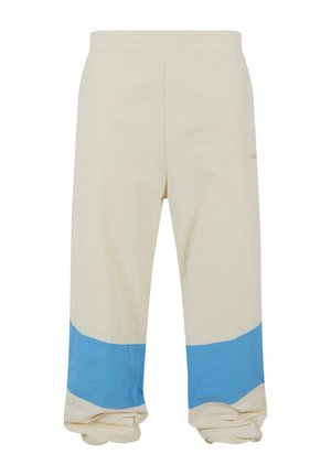 CORPORATE BLOCK - Tracksuit bottoms - creme light blue