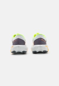 New Balance FUELCELL REBEL V4 - Road running shoes - white