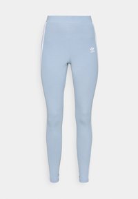 Světlé modré legíny Adidas s vysokým páskem, bílými bočními pruhy a malým bílým logem Adidas na levém stehně.