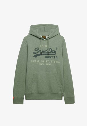 Sudadera con capucha de Superdry verde con bolsillo frontal, cordones y texto impreso que incluye "Vintage Superdry" y "Tokio, Japón".
