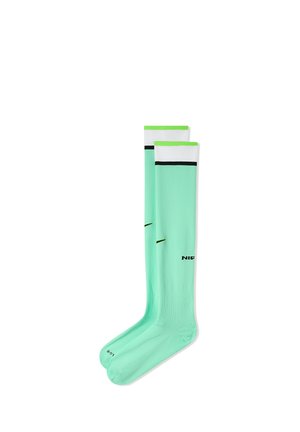 Para długich miętowo-zielonych skarpet z białymi górnymi paskami, czarnymi paskami i małym czarnym logo, położonych płasko na białym tle.