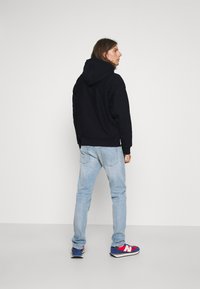 Carhartt WIP HOODED AMERICAN SCRIPT  - Sweatshirt com capuz - astro