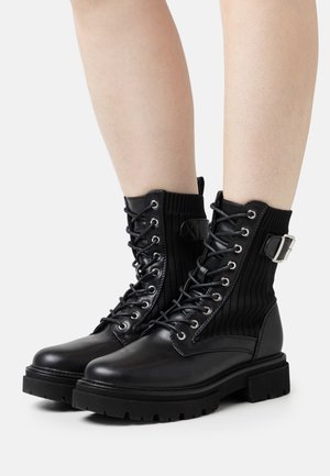 Anna Field Stivaletti con plateau - black
