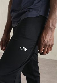 ICANIWILL ACTIVITY PANTS MEN - Treniņtērpa apakšdaļas - black