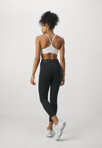 Nike Performance Leggingek - black/anthracite/white