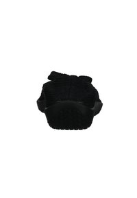 Scarpa nera in tessuto intrecciato, con tomaia testurizzata e suola in gomma, dotata di un tacco discreto e di un tab per facilitare l'indossamento.