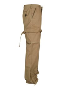 Beige cargobyxor med rak passform, flera fickor och dragkedjor vid bensluten. Tillverkade av slitstark bomullstyg.