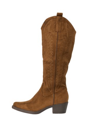 Bruine suède westernlaarzen tot over de knie met geborduurde details en een lage blokhak.