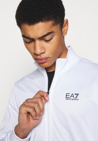 EA7 Emporio Armani TRACKSUIT - Tuta - white/black