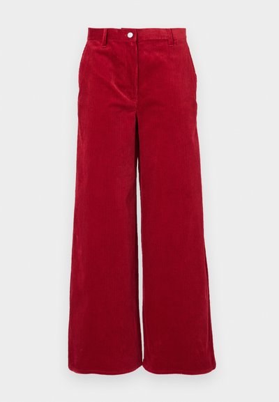 Red corduroy wide-leg pants with a textured fabric, featuring a classic button closure and high waist. Smooth finish with vertical ribbing.