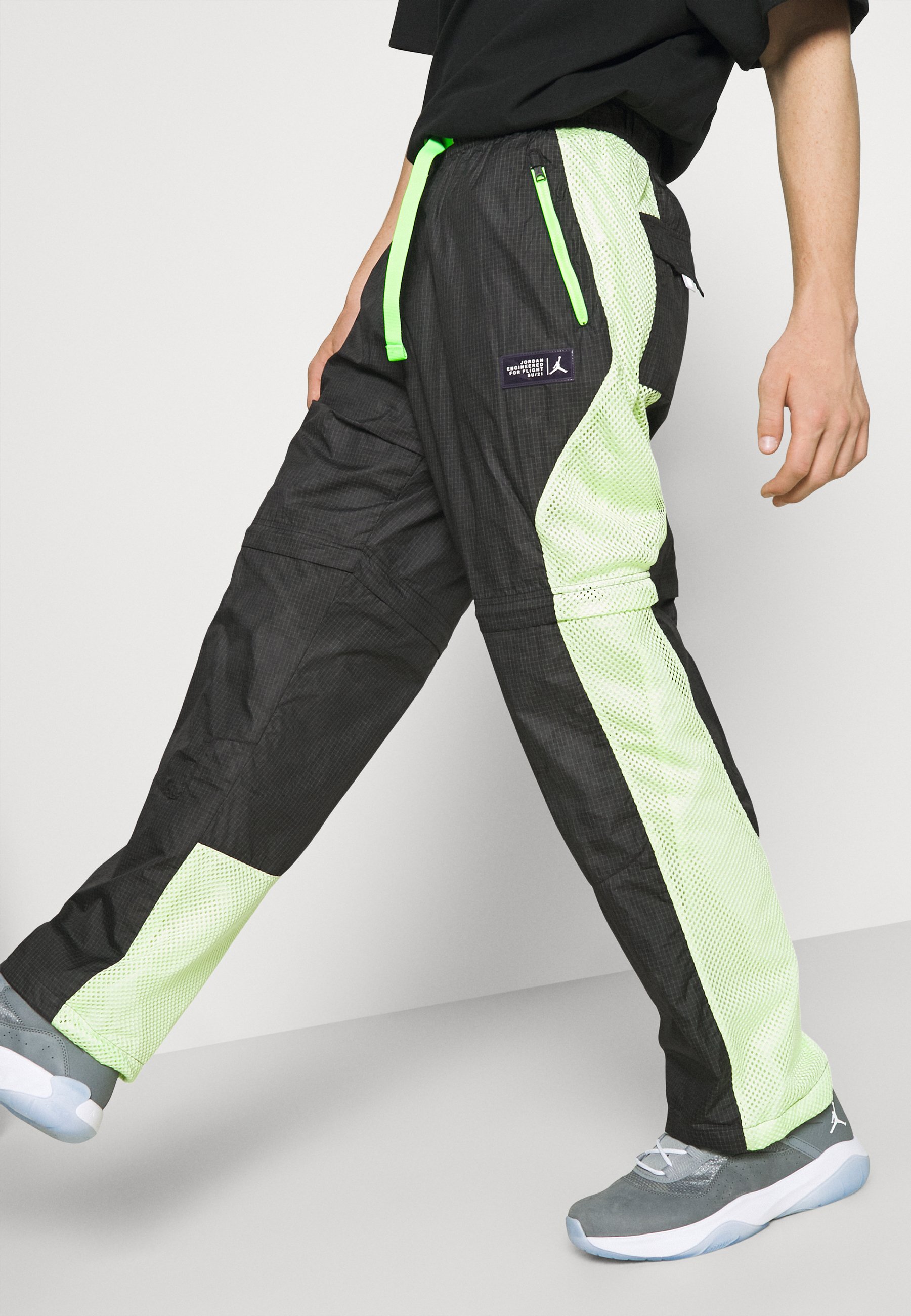 Jordan TRACK PANT - Pantalones deportivos - black/light liquid  lime/electric green/negro - Zalando.es