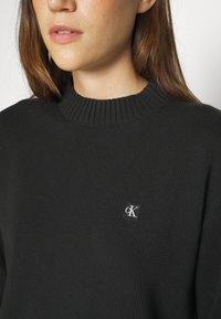 Calvin Klein Jeans BADGE - Strickpullover - black