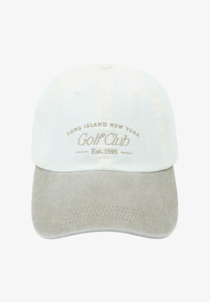Hvid og beige baseballkasket med "Long Island New York Golf Club Etableret 1995" broderet i beige på frontpanelet.