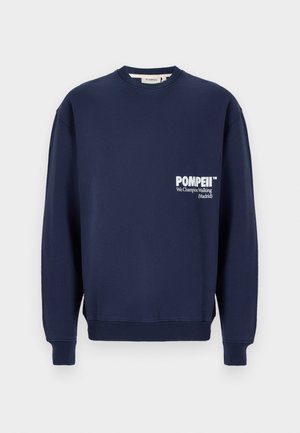 Navy blue sweatshirt made of soft cotton, featuring a crew neck, ribbed cuffs, and a front pocket with white printed text.