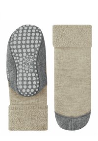 Calze in misto cotone con parte superiore beige, polsino a lavorazione testurizzata, suola antiscivolo grigia con punti bianchi e cucitura della punta liscia.