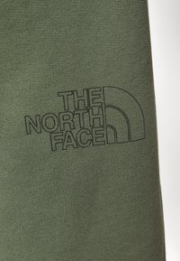The North Face Träningsbyxor - dark green
