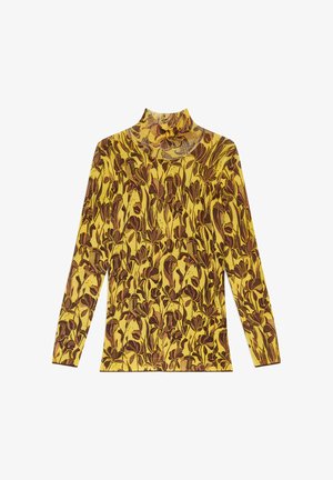 T-shirt à manches longues et col roulé jaune avec imprimé floral marron. Caractérisé par une coupe ajustée et un tissu texturé. Idéal pour le superposition et une tenue décontractée.