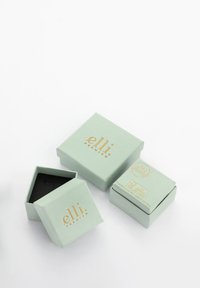 To lys grønne gaveæsker lavet af papir, med guld "elli premium" tekst. Den ene æske er åben og afslører en sort inderside.