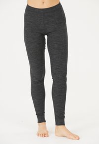 Schwarze, figurbetonte Leggings aus einem weichen, melierten Stoff. Mit einem hohen Bund und schmal zulaufenden Beinen mit Fußöffnungen.