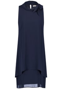 Vestido sin mangas de color azul marino con escote alto, detalle de ojal y un lazo decorativo en el hombro; tejido fluido y suave con un dobladillo asimétrico.