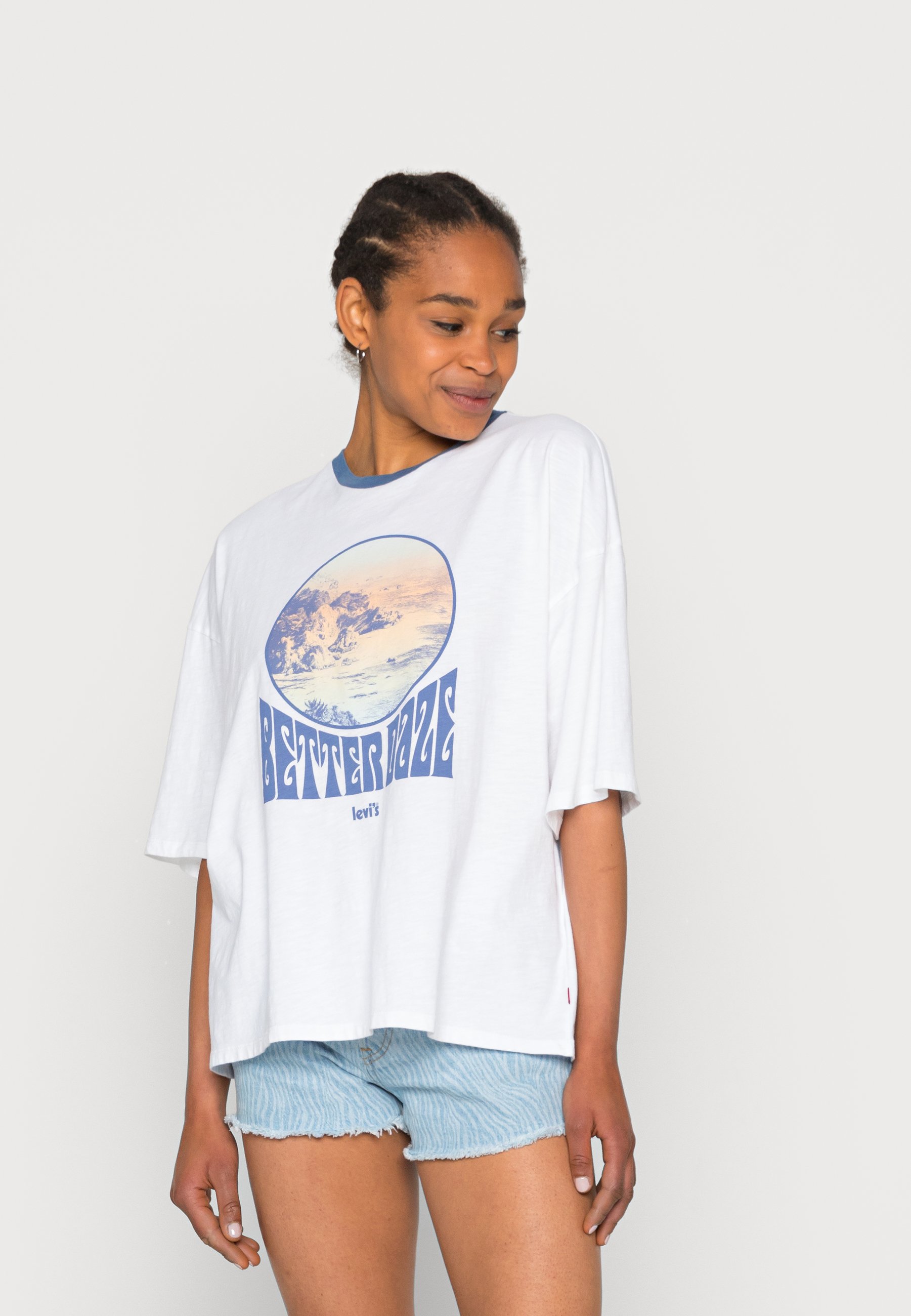 white tee with blue graphic
