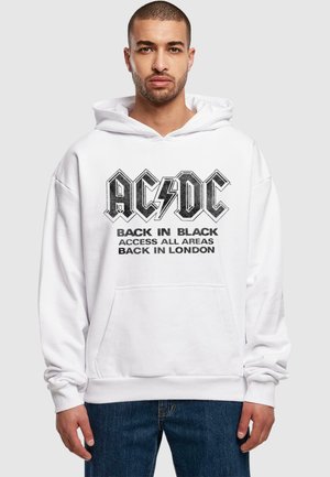 White hooded sweatshirt with large black AC/DC logo and text "BACK IN BLACK ACCESS ALL AREAS BACK IN LONDON," featuring a front pocket.