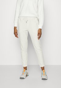 Athleta FARALLON - Calças de fato de treino - magnolia white