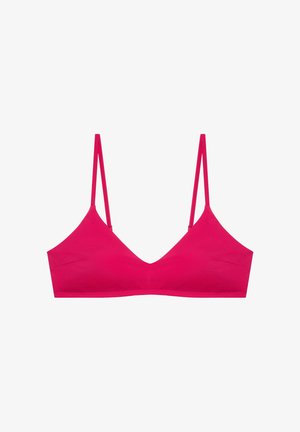 Soutien-gorge rose vif avec fines bretelles doubles et un design simple et lisse, présenté sur fond blanc.