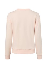 Sweat-shirt rose clair, tissu doux, col rond côtelé, épaules tombantes, manches longues, poignets et ourlet côtelés pour une coupe décontractée.