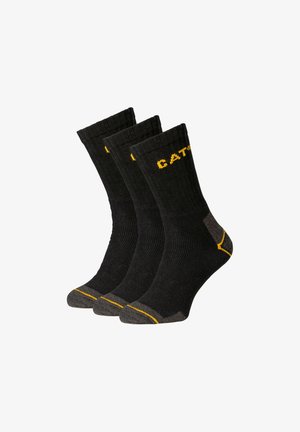 Schwarze Socken mit geripptem Muster und gelbem "CAT"-Logo oben. Mit verstärkten grauen Fersen- und Zehenakzenten. Set aus drei Paaren.