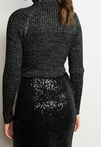Next Sweter