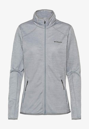 Chaqueta de forro polar gris claro con cremallera completa, cuello alzado, dos bolsillos laterales con cremallera, mangas largas y pequeño logotipo negro de Columbia en el pecho.