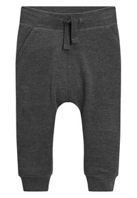 Pantaloni jogger in cotone grigio con vita regolabile, tasche laterali, orli affusolati e una texture morbida.